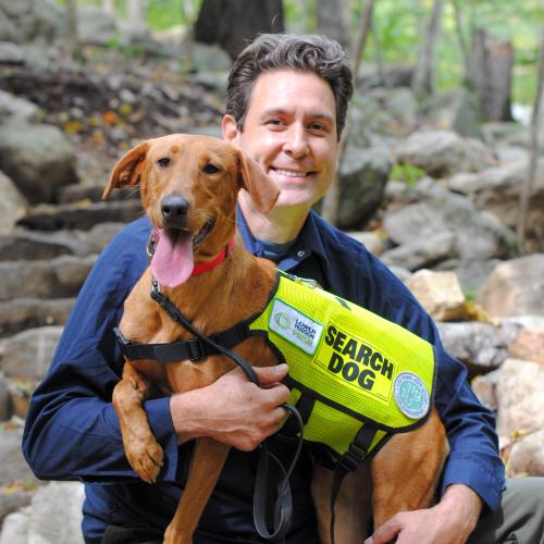 Joshua Beese and Dia the Conservation Detection Dog. Photo by Heather Darley.